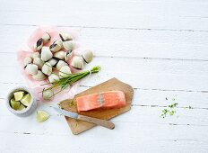 Salmon fillet, clams, chives and limes