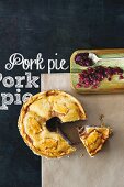 Pork pie with cranberries, sliced