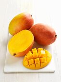 Mangos, whole and sliced