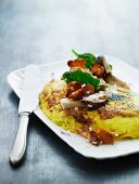 An omelette with goat's cheese and mushroom salad