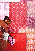 Rugs in shades of red in living room with coffee table