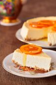 Cheesecake with oranges served with tea