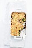 Courgette crumble with ham and mushrooms