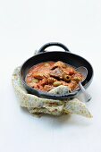 Veal ragout with olives and tomatoes