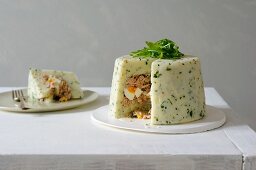 Potato Charlotte with tuna and egg