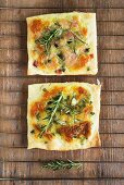 Mozzarella, onion and rosemary pizzas