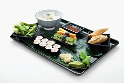 Sushi platter with rice and soy beans