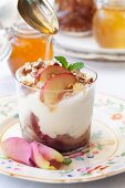 Baked nectarine trifle and caramelised pecan nuts