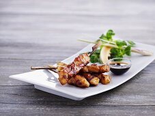 Satay skewers with soy sauce