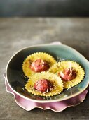 Beetroot panzerotti with garlic butter, poppy seeds and Pecorino cheese
