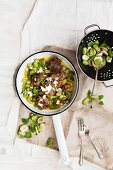Chermoula and lamb meatballs with broad beans, feta cheese and mint