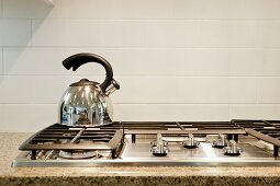 Detail of kettle on modern hob