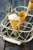 Vanilla ice cream cones in a cone holder