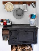 Vintage kitchen stove with firewood store