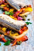 Grilled mackerel with peppers and capers on toast
