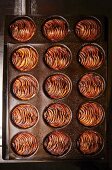 Apple tarts in baking tins