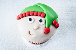 A Christmas elf cupcake