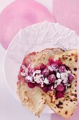 Pancakes with raspberries, honey and almonds