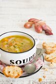 Shallot and vegetable soup with grilled bread