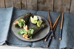 Temaki sushi with tempura prawns and coriander