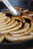 Sausages in a frying pan