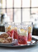 Rhubarb compote with mascarpone cream and lemon zest in glasses