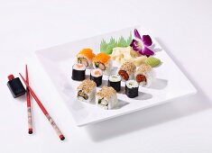 A sushi platter of maki and California rolls