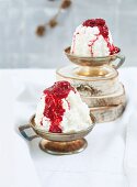 Coconut rice pudding cakes with raspberry sauce for Christmas