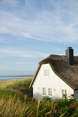 A thatched roof house by the sea in Ahrenshoop, Fischland-Darss-Zingst peninsula