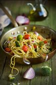 Spaghetti with turmeric vegetables and marjoram
