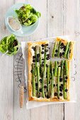 Asparagus and olive cake with green salad