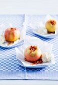 Baked apples with ginger on parchment paper