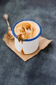 Homemade creamy caramel and cinnamon ice cream with caramel sauce