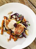 Veal steak with root vegetables and a tuna and olive cream