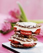 Oat biscuit sandwiches with strawberries and vanilla cream