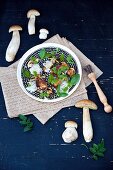 Fried porcini mushrooms with Parmesan cheese and basil oil
