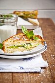 French toast with avocado, feta cheese and basil served with a glass of milk