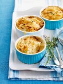 Three small potato gratins with thyme