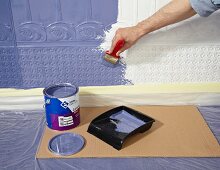 Painting Lincrusta (structured linoleum wallpaper) with blue paint