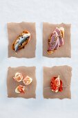 Sardinen-Crostino, Entenbrust-Crostino, Wachteleier mit Schinken und Feige mit Chorizo