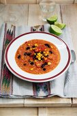 Sweet potato and tomato soup with sweetcorn, chilli and black beans