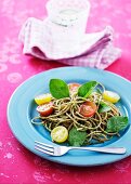 Wholemeal spaghetti with cherry tomatoes and basil