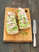 Baguette with guacamole and smoked mackerel