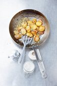 Fried potato in a pan