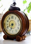 Vintage table clock with wooden frame