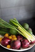 White dish of fresh vegetables