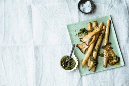 Fried black salsify with king trumpet mushrooms and pesto