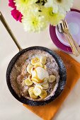 Oven-baked pancakes with banana, rice pudding and honey