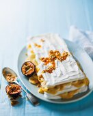Meringue slices with a banana and passion fruit sauce
