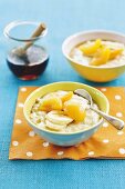 Coconut rice pudding with maple syrup, bananas and apricots